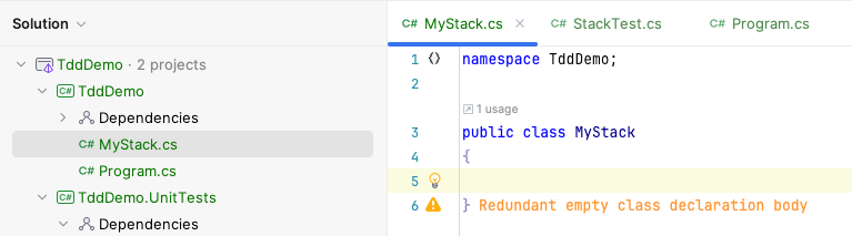 JetBrains Rider with a new class called "MyStack" in the "TddDemo" project that is our application in this case.